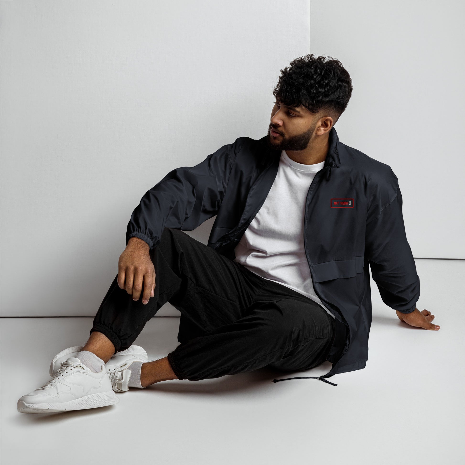Black Mat Theory Unisex Windbreaker